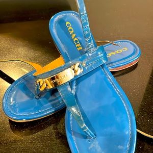 Pair of Coach blue patent thong sandals.  Like New!!